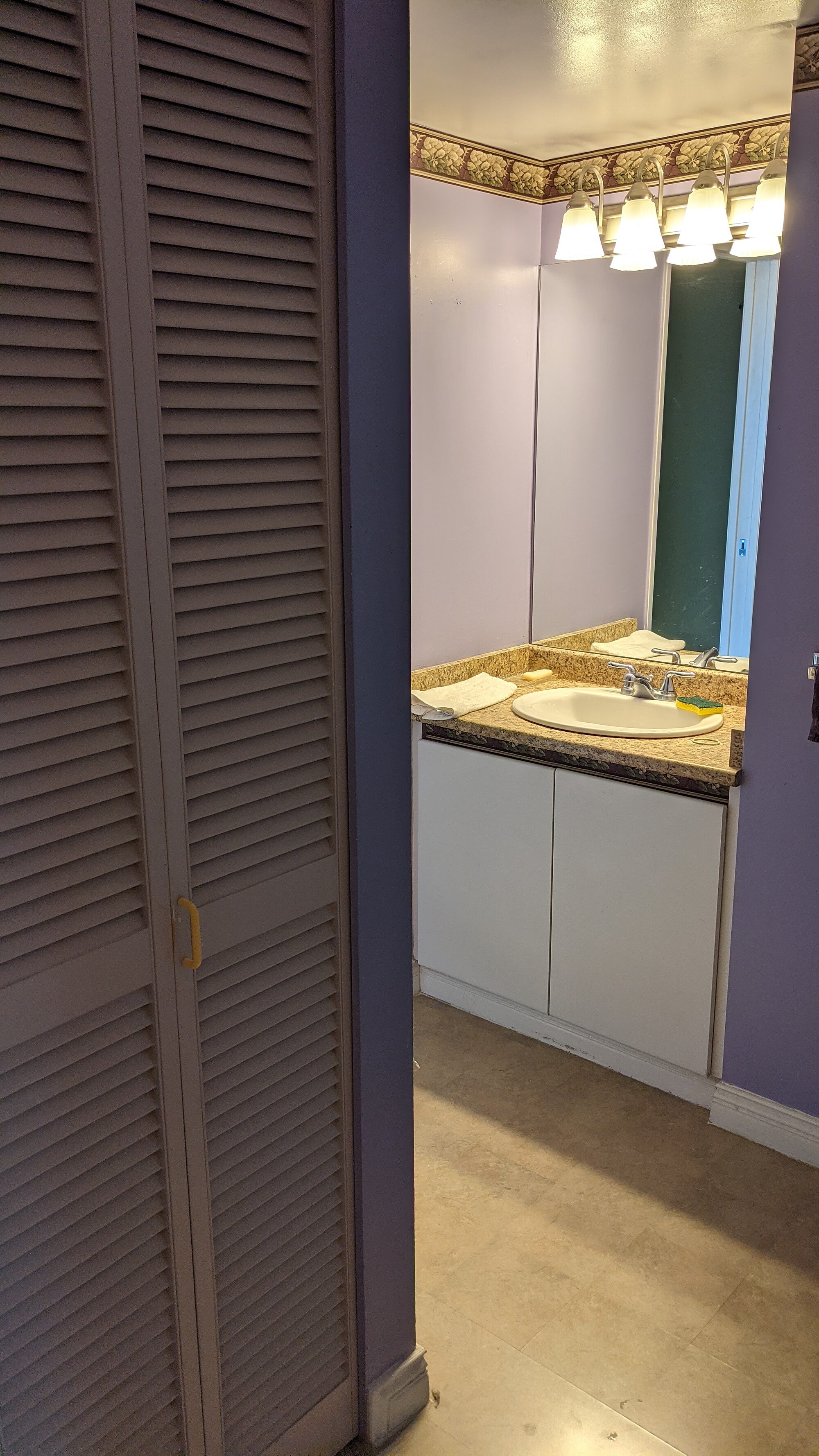 Dated bathroom vanity before remodel